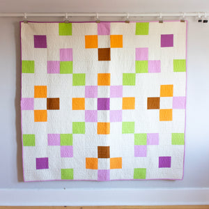 Full view of Dolly Mix throw size quilt